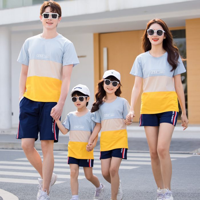 Family wearing striped matching t-shirt and shorts summer outfits