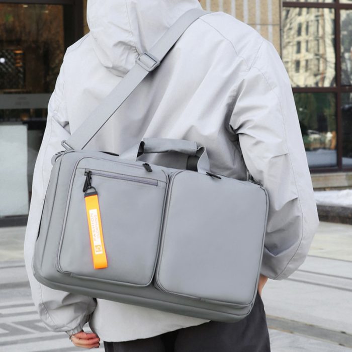 The spacious interior compartments of a large capacity commuter laptop backpack.