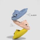 Unisex quick drying shark slippers with drain holes made of comfortable EVA foam.