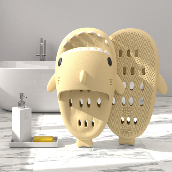 8b75a16b-907a-483b-8693-9264f1ec1b96.jpg Unisex quick drying shark slippers with drain holes made of comfortable EVA foam.