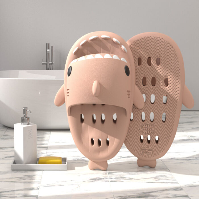 8f179ff8-c22d-4604-bfcf-e8ceaee9c0e4.jpg Unisex quick drying shark slippers with drain holes made of comfortable EVA foam.