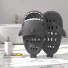 Unisex quick drying shark slippers with drain holes made of comfortable EVA foam.