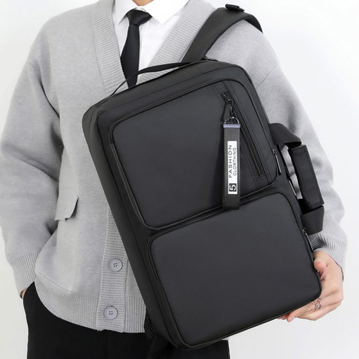 The spacious interior compartments of a large capacity commuter laptop backpack.