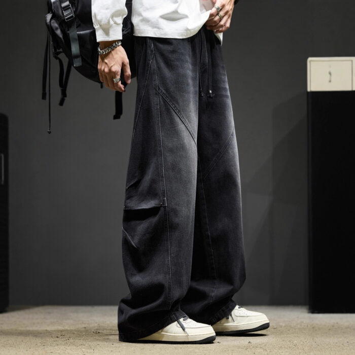 Stylish young man wearing trendy mens wide leg denim cargo pants.