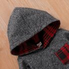 Cute baby wearing a cozy long sleeve baby plaid sweater terno.