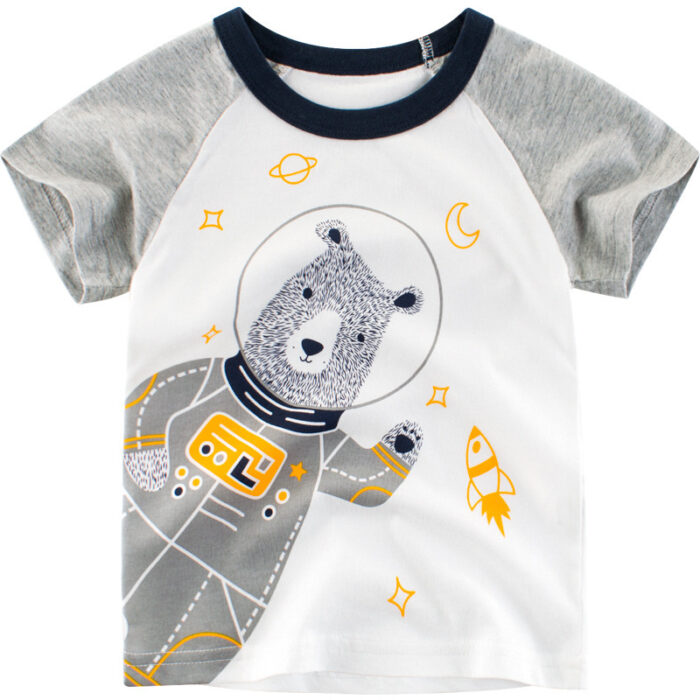 1198288670028.jpg Happy child wearing a colorful kids cartoon graphic t-shirt.