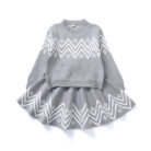 Young girl smiling in a stylish and comfortable girls long sleeve skirt set.