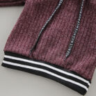 Cute toddler wearing a cozy and stylish baby knit sweater terno.