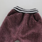Cute toddler wearing a cozy and stylish baby knit sweater terno.