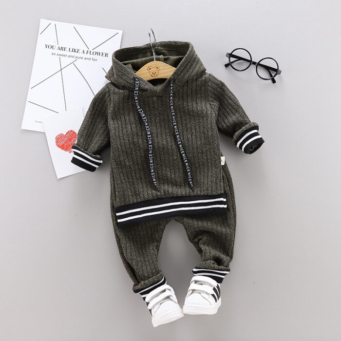 Cute toddler wearing a cozy and stylish baby knit sweater terno.