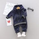 Cute toddler wearing a cozy and stylish baby knit sweater terno.