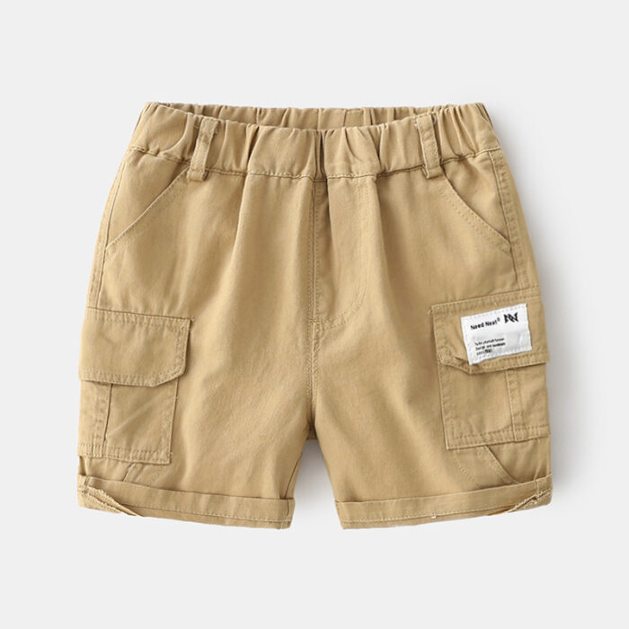 1615103126086.jpg Young boy playing outdoors wearing comfortable boys cotton summer shorts.