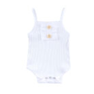 Baby girl smiling in a beautifully soft baby girl romper and skirt set.