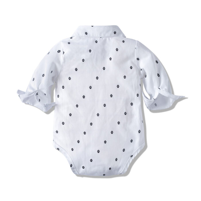 Handsome little boy wearing a stylish boys formal suspender terno set.