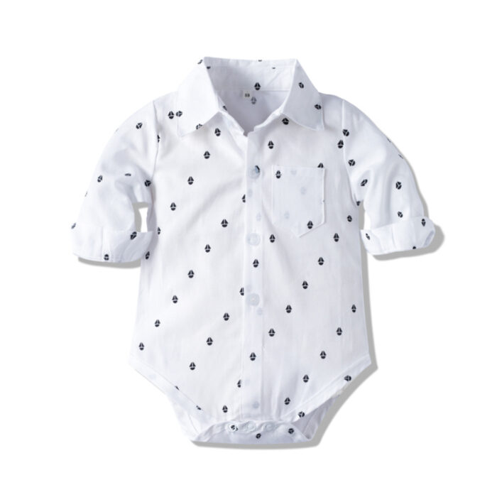 Handsome little boy wearing a stylish boys formal suspender terno set.