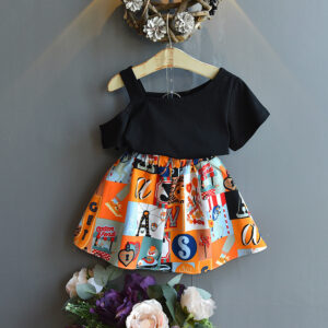 Happy little girl smiling in a beautifully stylish girls ruffle collar skirt set.
