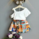 Happy little girl smiling in a beautifully stylish girls ruffle collar skirt set.