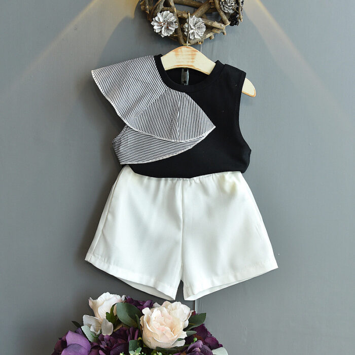 1622265896667.jpg Happy little girl smiling in a beautifully stylish girls ruffle collar skirt set.