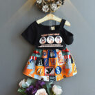 Happy little girl smiling in a beautifully stylish girls ruffle collar skirt set.