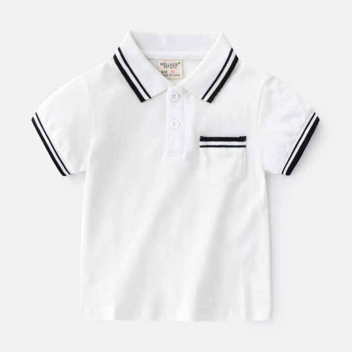1623402244149.jpg Young boy smiling outdoors wearing a comfortable boys short sleeve summer polo.