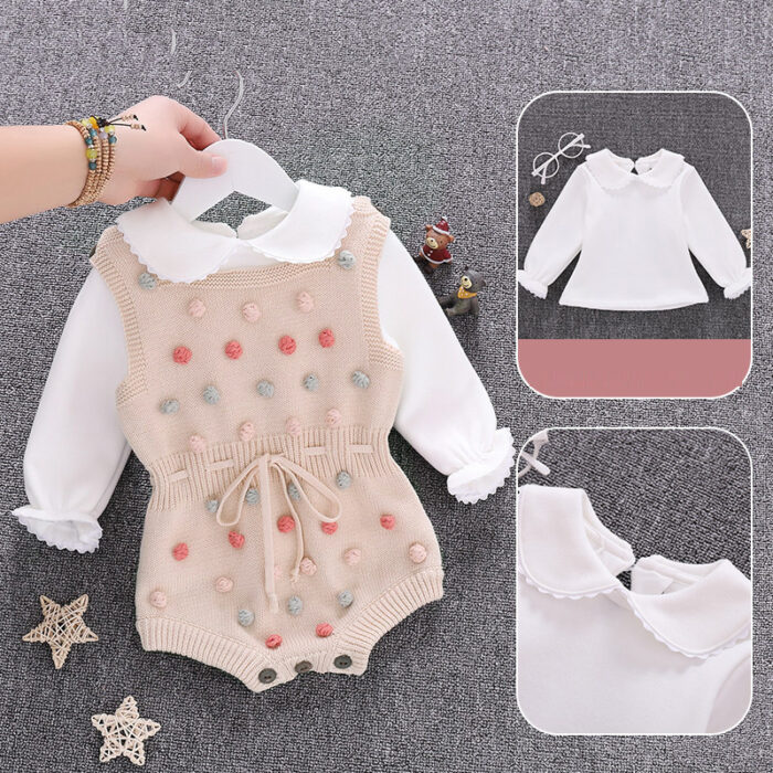 19759056828604.jpg Cute baby girl wearing a cozy, minimalist baby girl long sleeve romper.