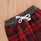 Cute baby wearing a cozy long sleeve baby plaid sweater terno.