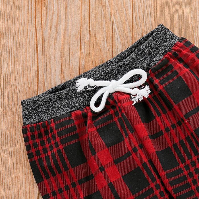 Cute baby wearing a cozy long sleeve baby plaid sweater terno.