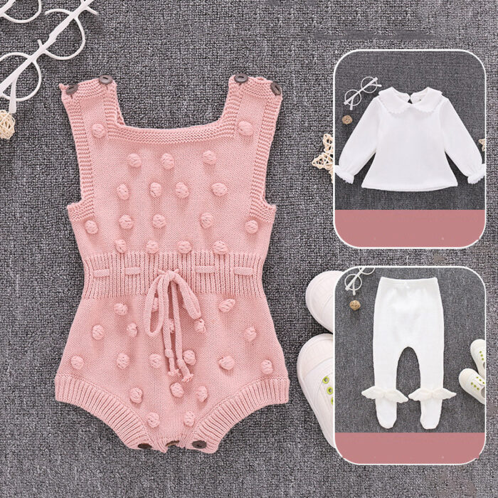 2187951731130.jpg Cute baby girl wearing a cozy, minimalist baby girl long sleeve romper.