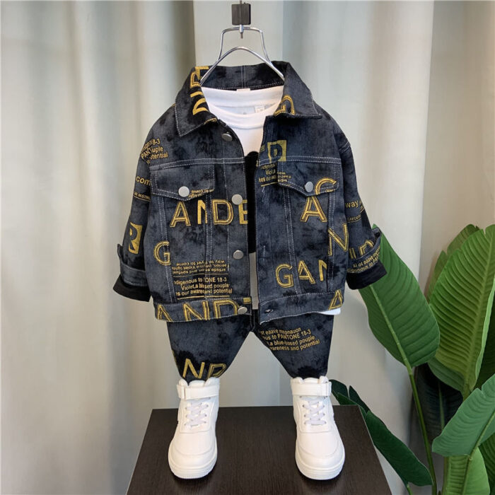 Handsome little boy wearing a stylish boys casual denim terno set.