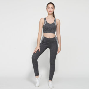 Woman wearing a premium 2-piece matching workout set and breathable sportswear, perfect for gym fitness