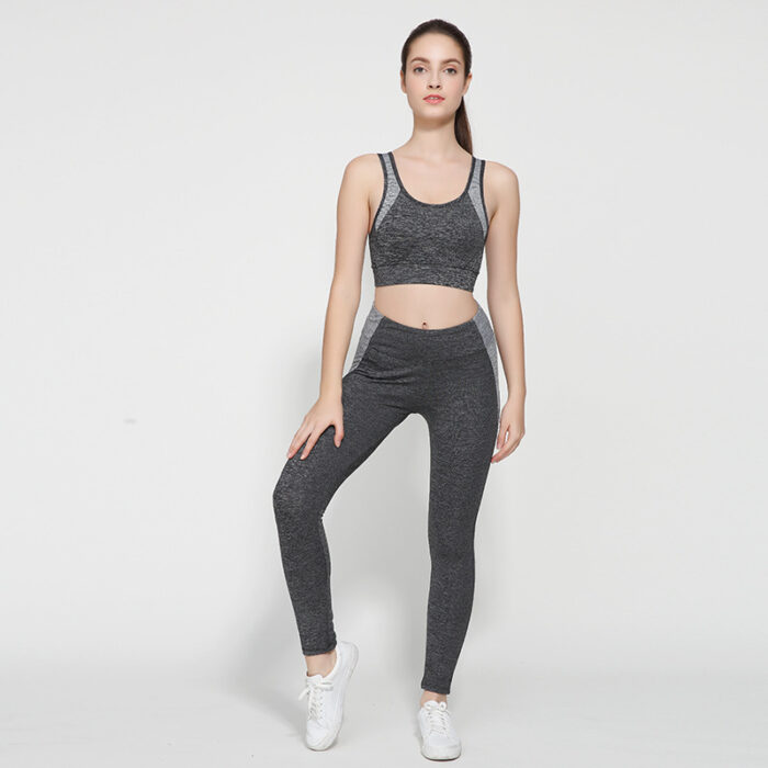 26563974591104.jpg Woman wearing a premium 2-piece matching workout set and breathable sportswear, perfect for gym fitness