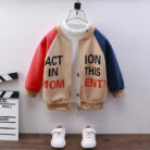 Happy child wearing a stylish kids casual cotton jacket with a fun print.