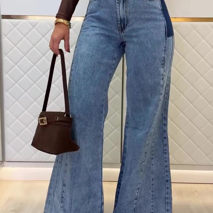 Woman wearing stylish women's high waisted flare jeans in a light blue wash.