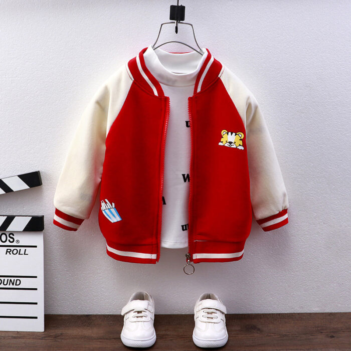 Happy child wearing a stylish kids casual cotton jacket with a fun print.
