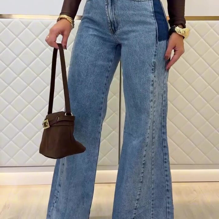 Woman wearing stylish women's high waisted flare jeans in a light blue wash.