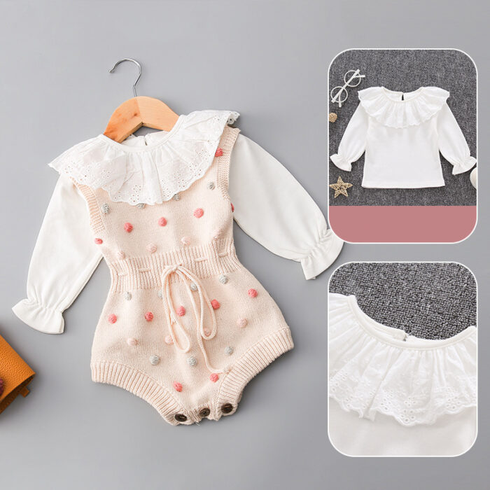 4060347001882.jpg Cute baby girl wearing a cozy, minimalist baby girl long sleeve romper.