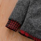 Cute baby wearing a cozy long sleeve baby plaid sweater terno.