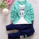 Active toddler playing happily in a comfortable toddler terno set.