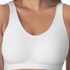 Woman wearing a premium plus size comfortable lifting bra, providing seamless wire-free support for large busts.