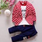 Active toddler playing happily in a comfortable toddler terno set.