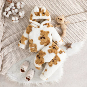 Adorable baby wearing a cozy milky white baby bear velvet terno set.