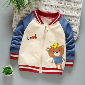 Happy child wearing a stylish kids casual cotton jacket with a fun print.