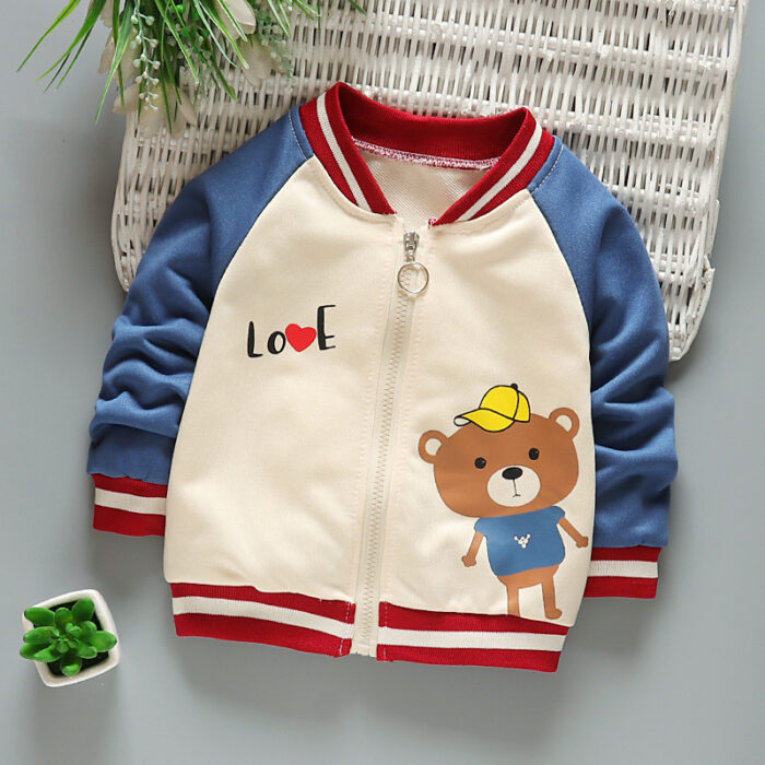 Happy child wearing a stylish kids casual cotton jacket with a fun print.