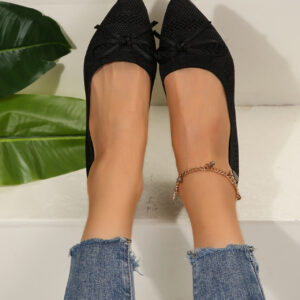 Women's knitted pointed-toe loafers with a stylish bow, perfect as comfortable office shoes for women.