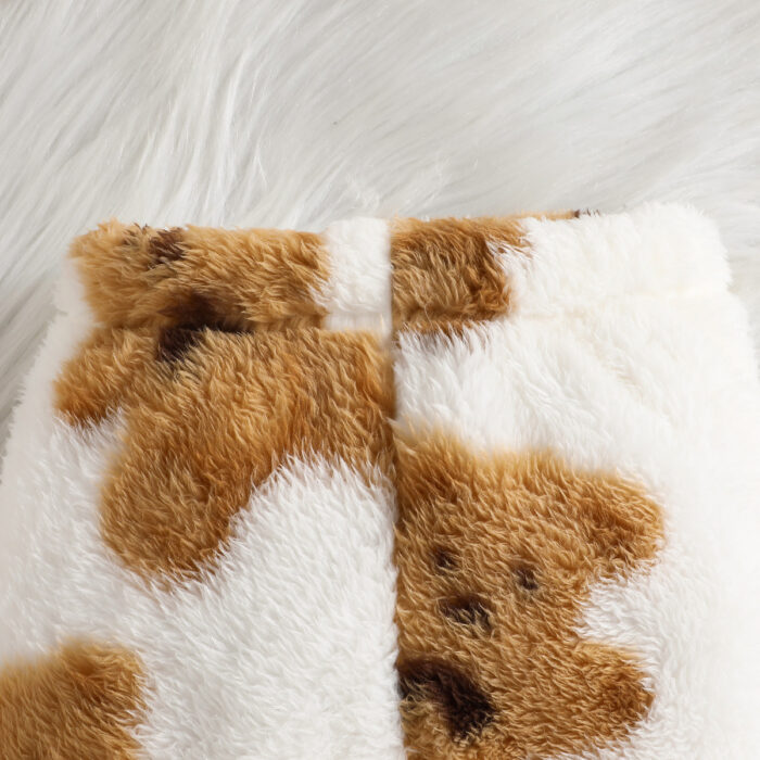 Adorable baby wearing a cozy milky white baby bear velvet terno set.