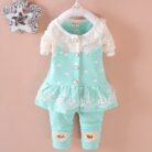 Cute toddler girl smiling in a comfortable toddler girl tracksuit set.