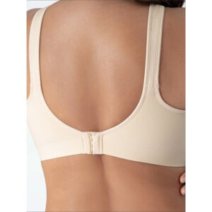 Woman wearing a premium plus size comfortable lifting bra, providing seamless wire-free support for large busts.