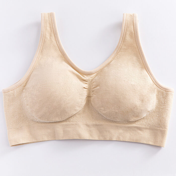 Woman wearing a premium plus size comfortable lifting bra, providing seamless wire-free support for large busts.