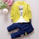 Active toddler playing happily in a comfortable toddler terno set.