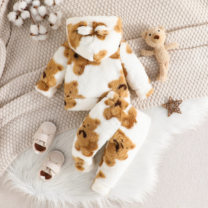 Adorable baby wearing a cozy milky white baby bear velvet terno set.